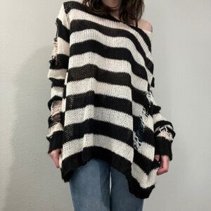 Distressed knit sweater